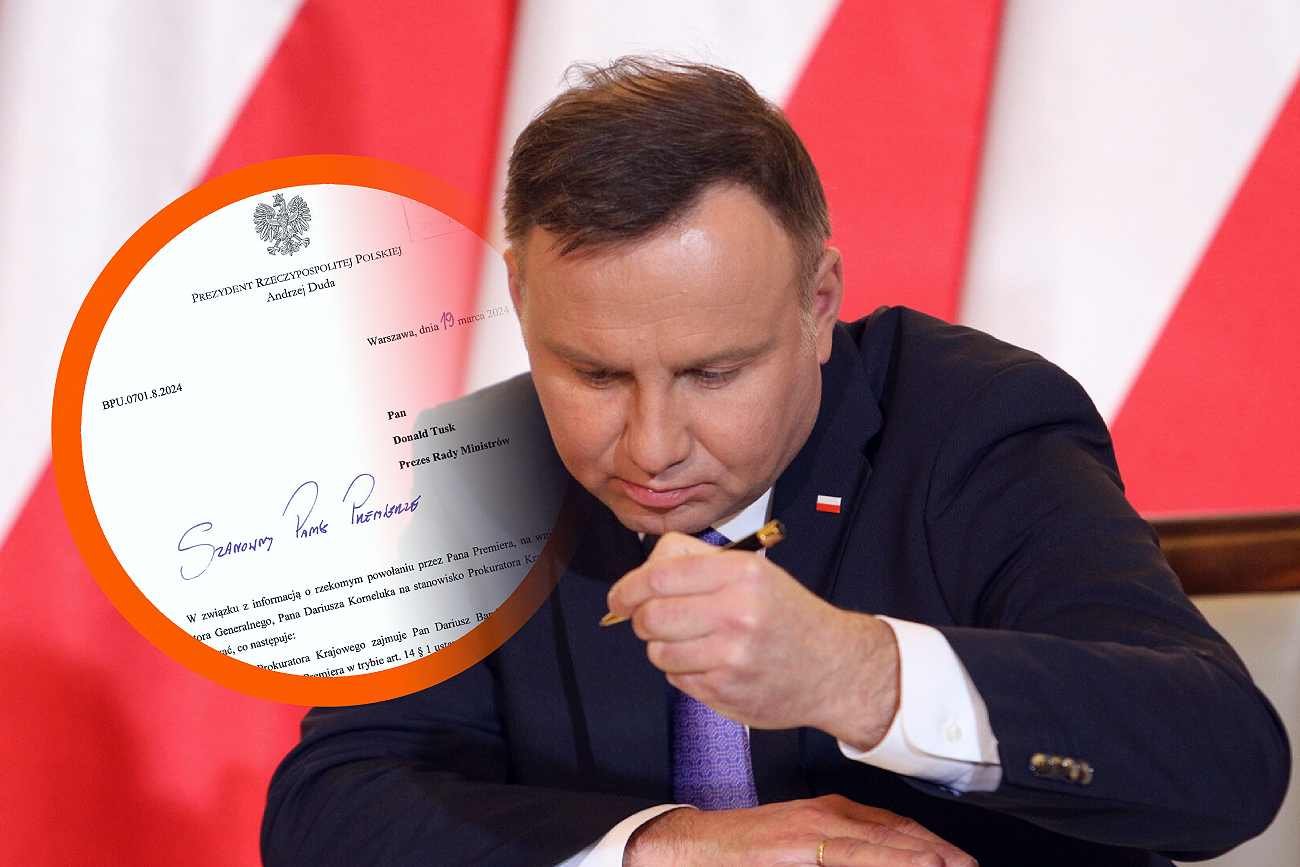 Andrzej Duda z długopisem.