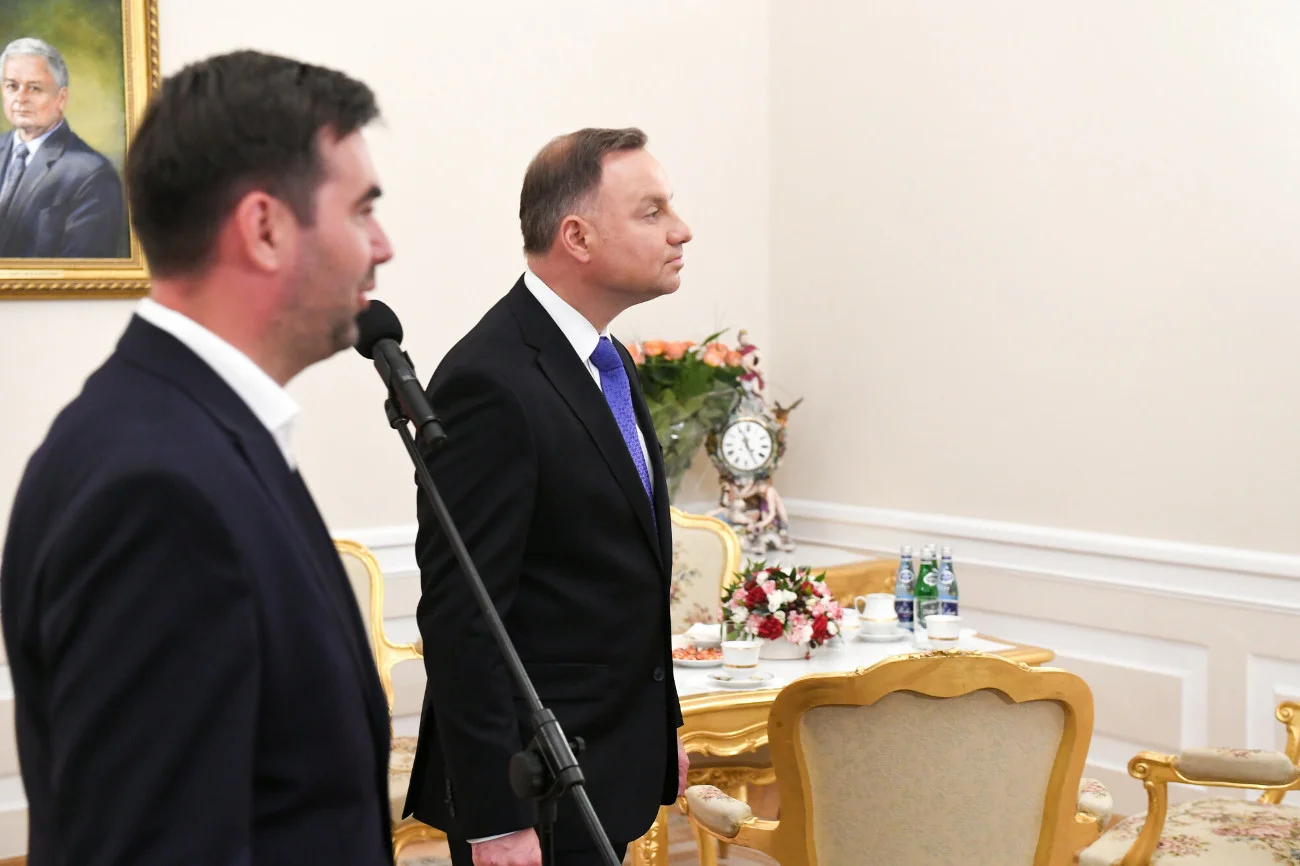 Rzecznik prezydenta RP Błażej Spychalski i prezydent Andrzej Duda