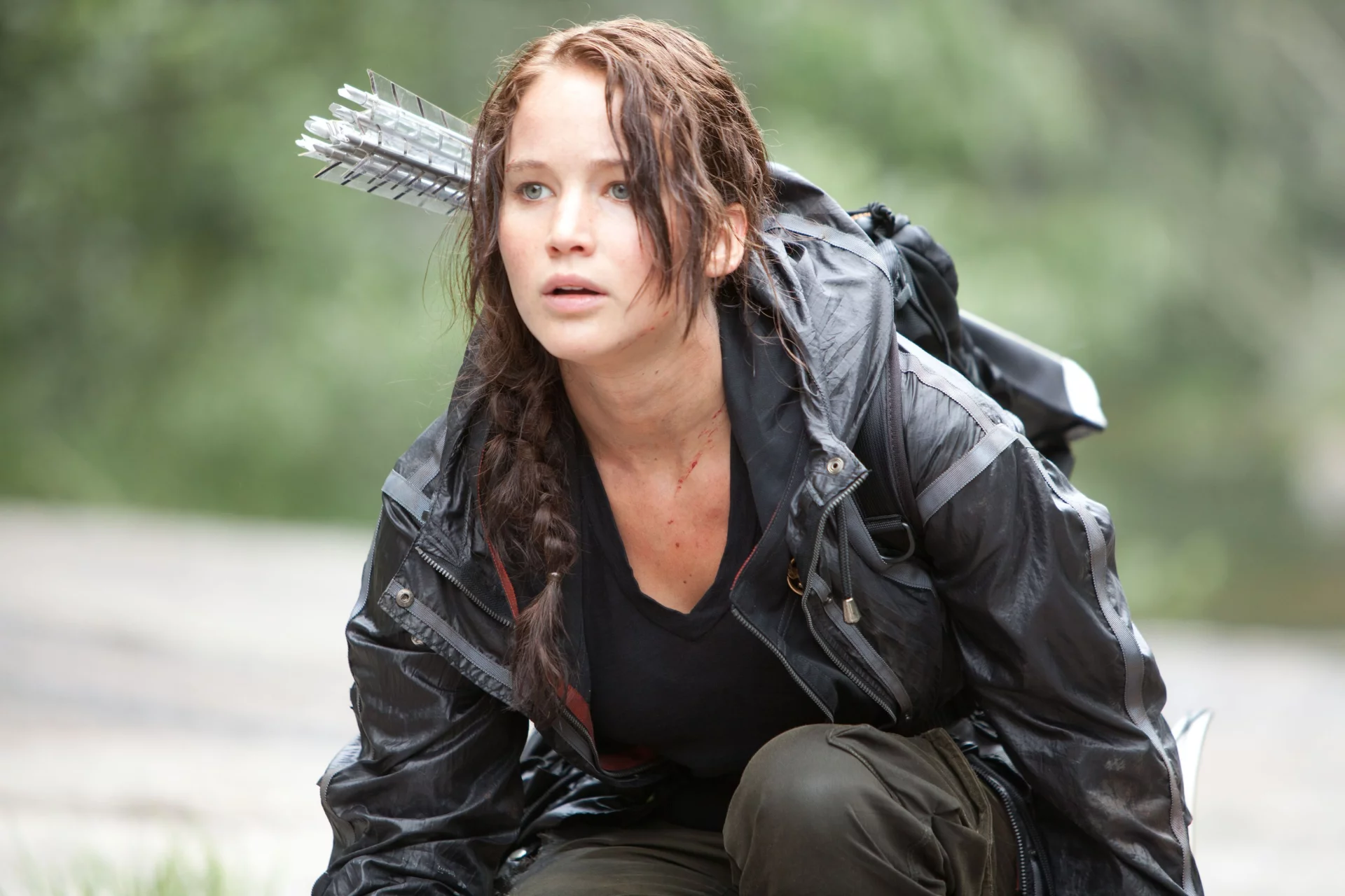 Jennifer Lawrence jako Katniss Everdeen.