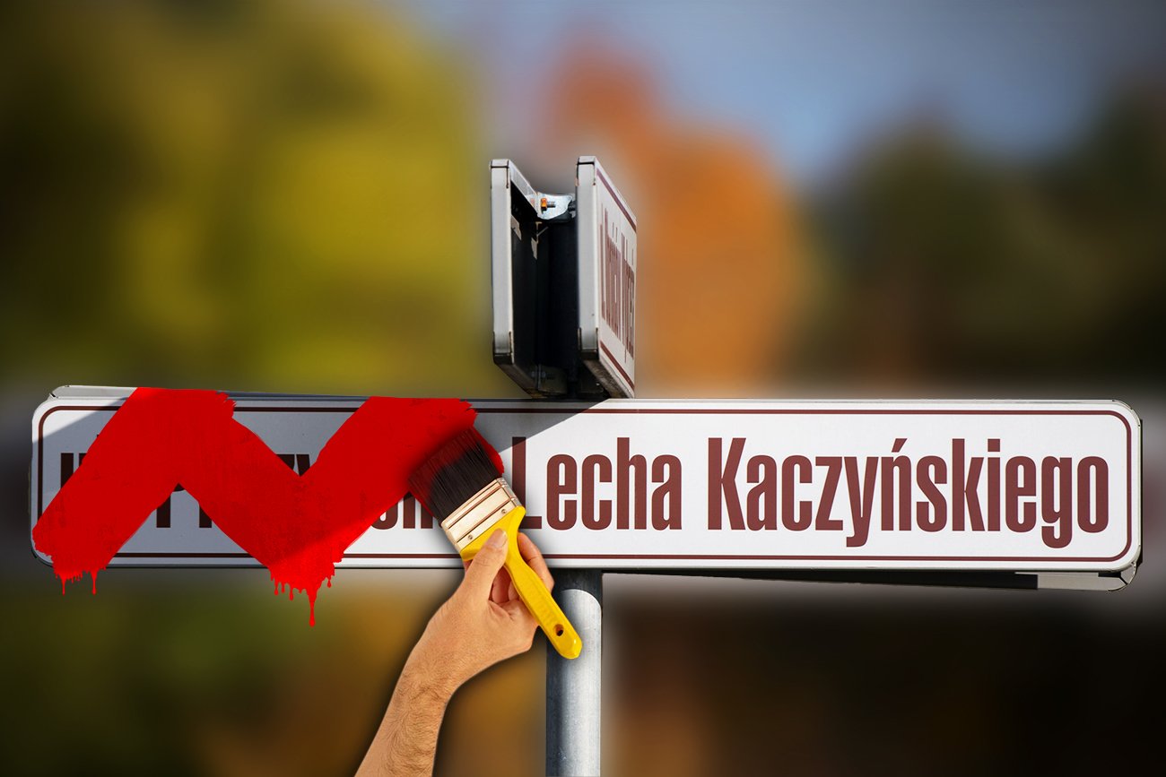 Ręka zamalowująca pędzlem z farbą tabliczkę z nazwą ulicy Prezydenta Lecha Kaczyńskiego.