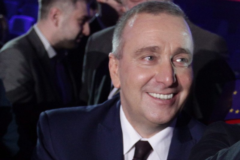 Grzegorz Schetyna i jego uśmiech.