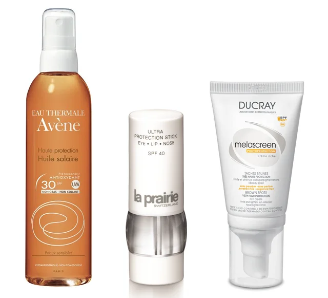 Olejek z filtrem SPF 30 Huile Solaire Avene (apteki), Sztyft ochronny do delikatnych miejsc, jak usta, powieki, nos z filtrem SPF 40 Ultra Protection Stick La Prairie, krem chroniący przed przebarwieniami z filtrem SPF 50 Melascreen Ducray (apteki)