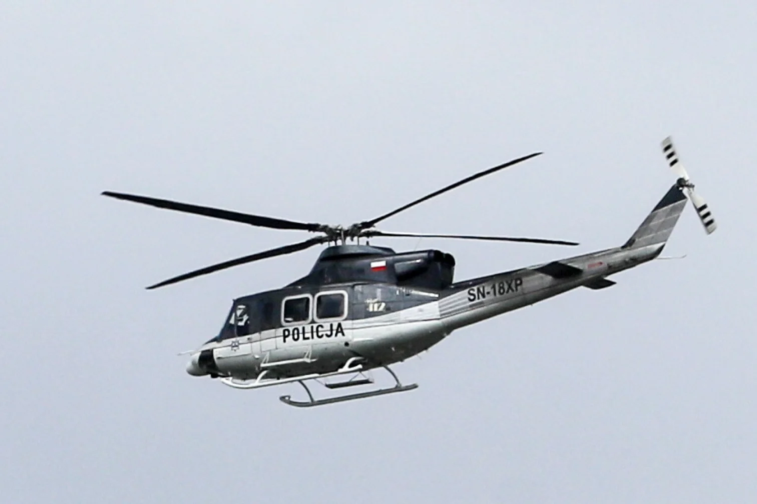 Policyjny helikopter. Zdjęcie ilustracyjne.