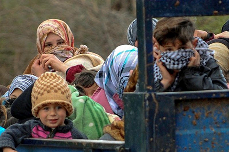 Syryjscy uchodźcy na granica syryjsko-tureckiej