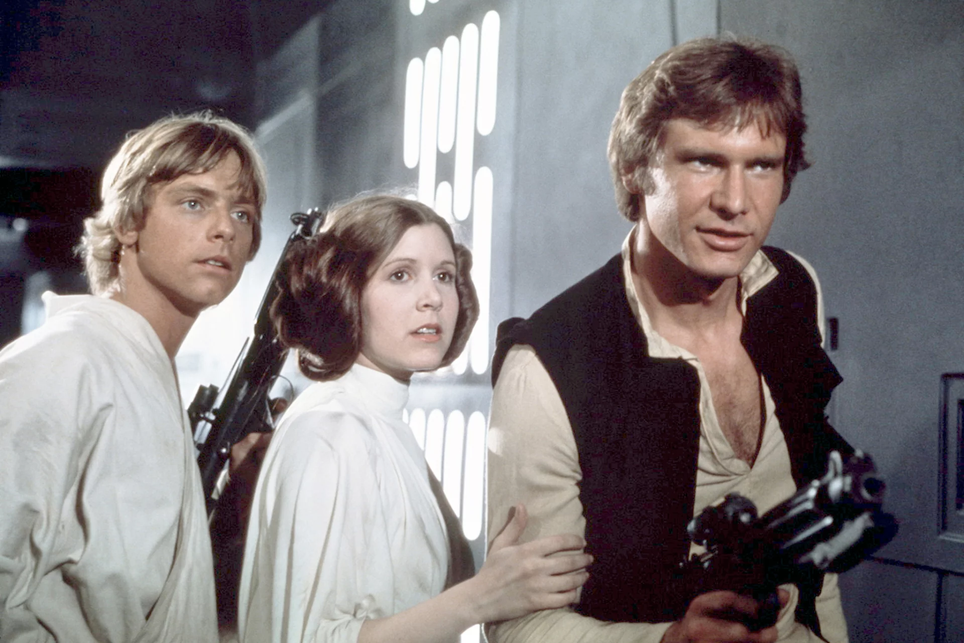Mark Hamill, Carrie Fisher i Harrison Ford w filmie "Nowa nadzieja".