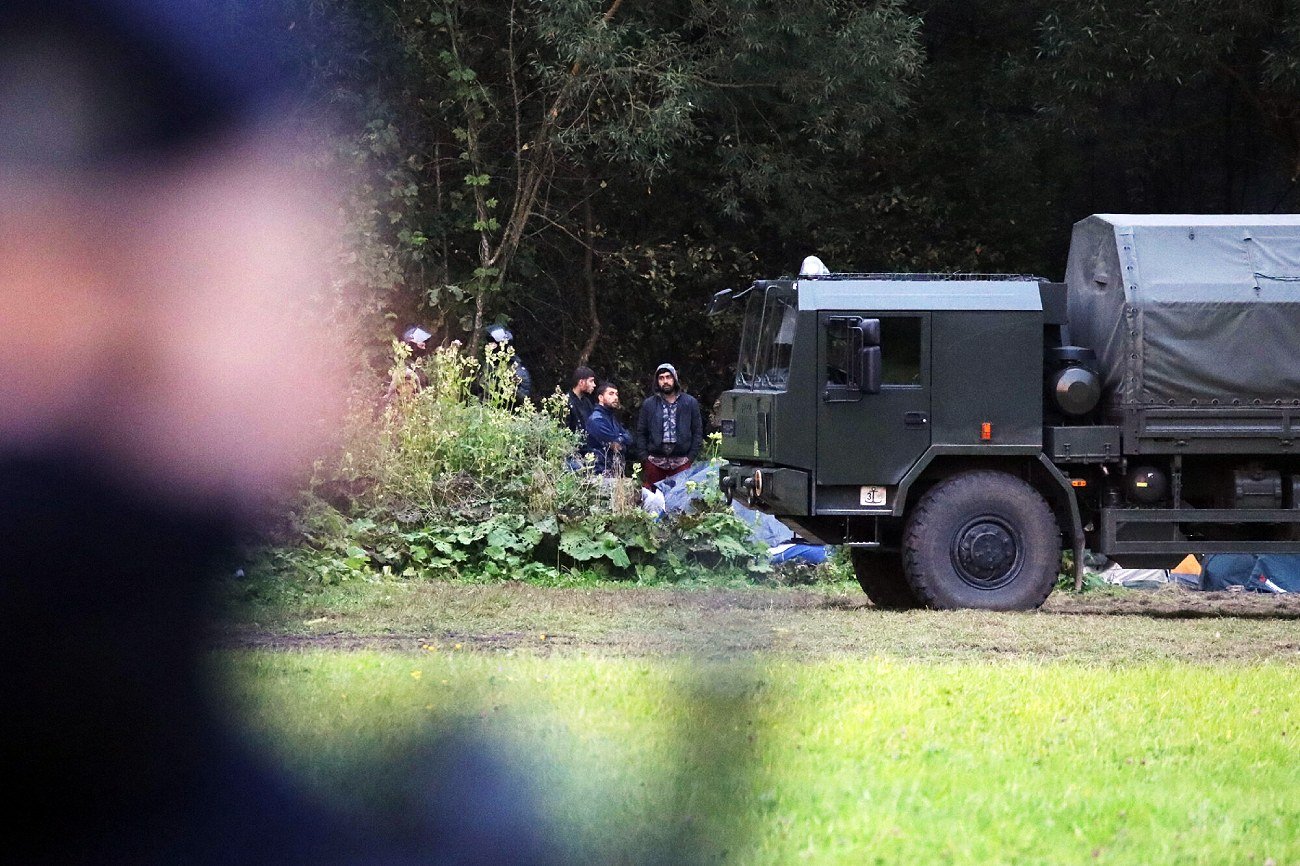 Migranci na granicy Polski z Białorusią.