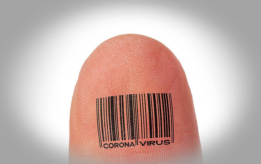 Kciuk z kodem kreskowym z napisem koronawirus podczas pandemii covid-19 na świecie.