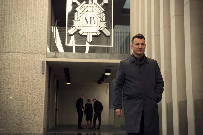 Robert Więckiewicz jako Anatol Janów.