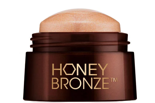 Sztyft brązująco-rozświetlający Honey Bronze Highlighting Dome The Body Shop