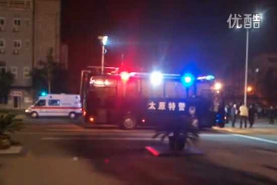 Kadr z zamieszek w chińskiej fabryce Foxconn