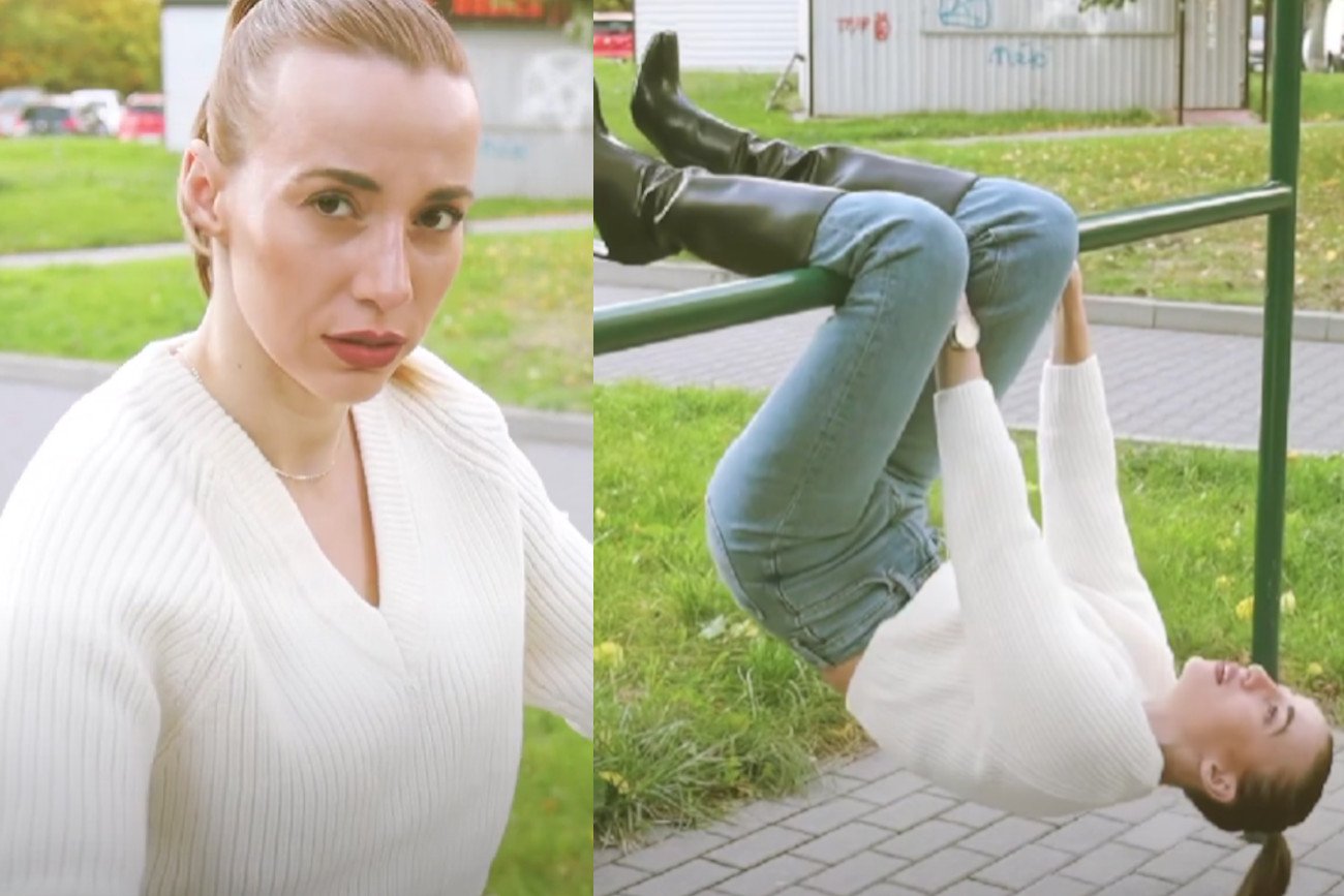 Marianna Schreiber rapuje o szarych ludziach i politykach, wyginając się na trzepaku.