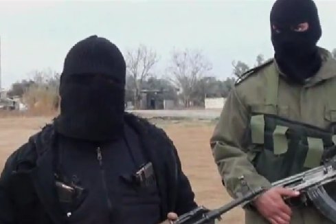 Zamaskowani członkowie Wolnej Armii Syryjskiej