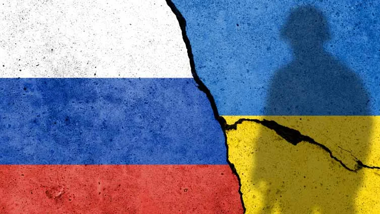 rosja-ukraina-flagi-wojna-zolnierz