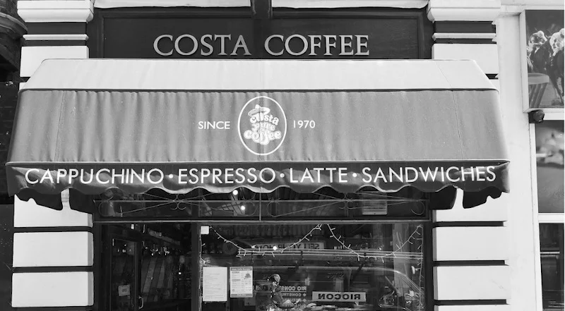 Jeden z pierwszych szyldów COSTA COFFEE