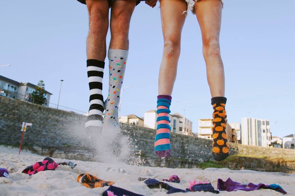 Fragment kampanii reklamowej skarpetek Happy Socks.