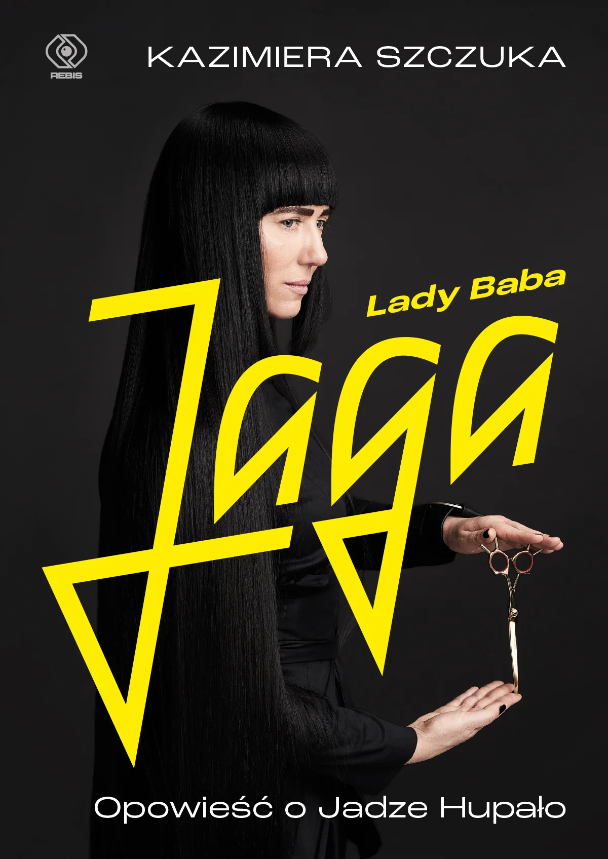 Okładka książki "Lady Baba Jaga", autorstwa Kazimiery Szczuki, ukazana nakładem przez Wydawnictwo Rebis. Okładkę z zdjęciem Izy Grzybowskiej stworzył Michał Pawłowski.
