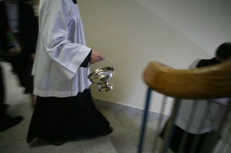 Raper Tau podpowiada katolikom, ile pieniędzy wkładać do koperty