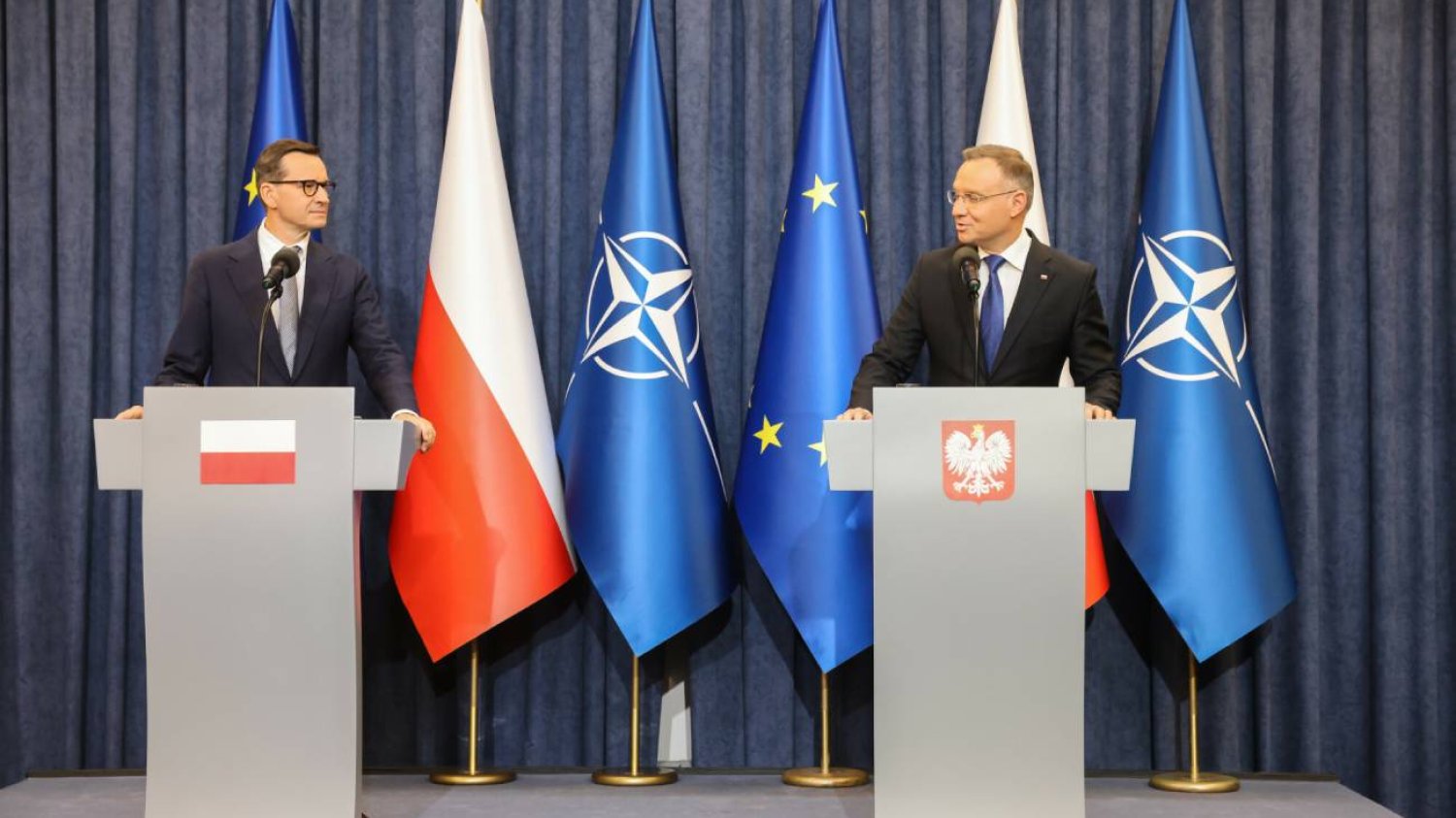 Duda o imigrantach i granicach RP. Niezapowiedziane wystąpienie z premierem