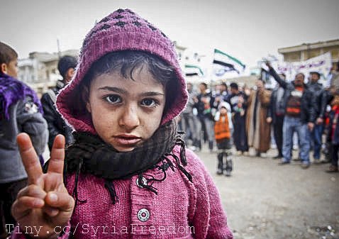 A young girl gestures during an anti-Assad protest in the town of Binnish, April 9, 2012 in Syria. UN-brokered Syria ceasefire in jeopardy.