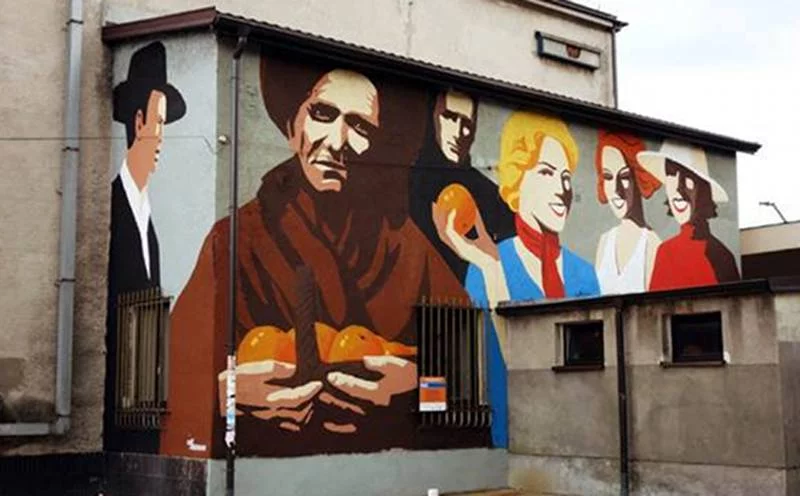 Mural w Falenicy, ul. Patriotów 44, autorzy: ad manum (Anna Koźbiel i Adam Walas)
