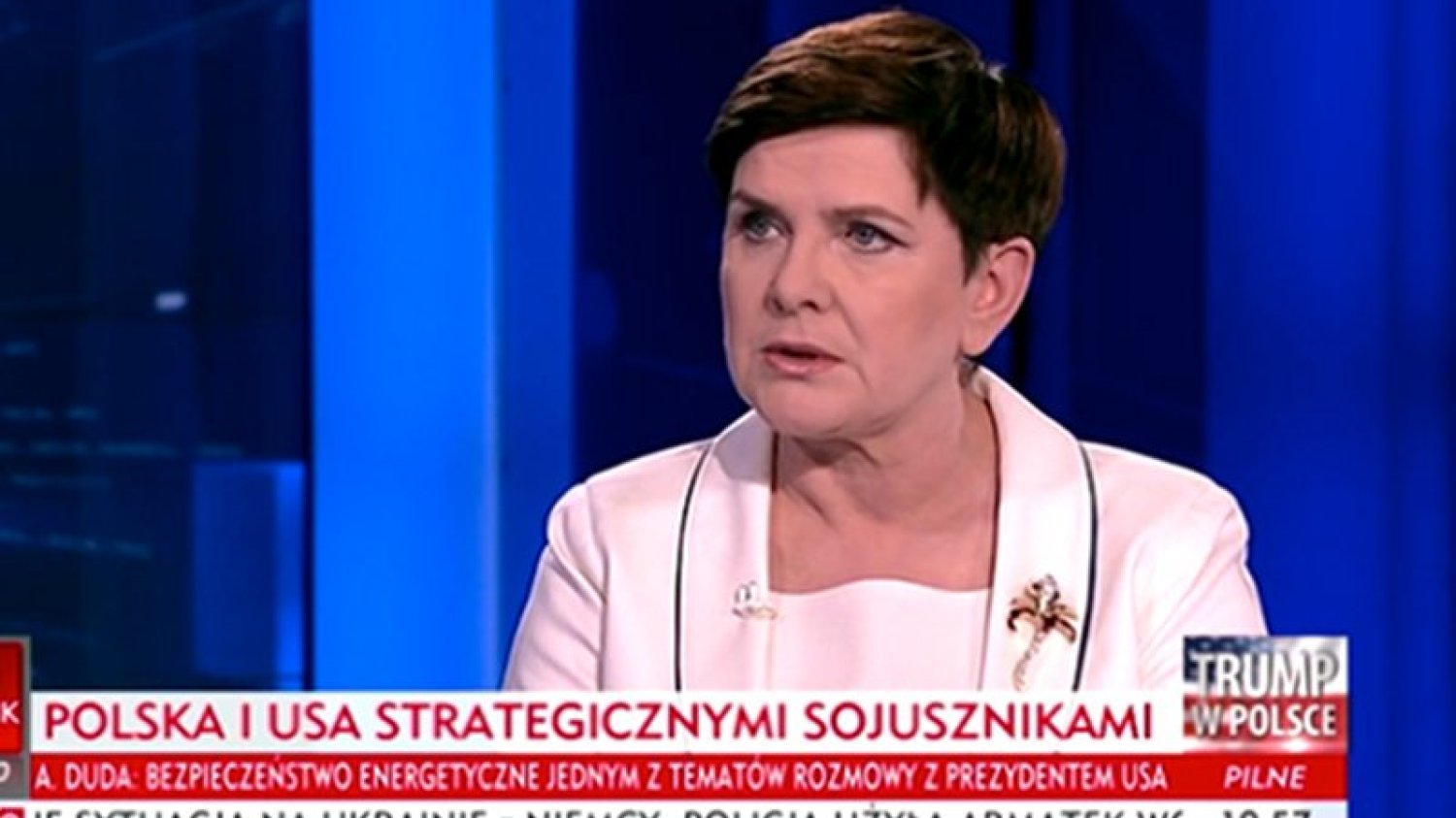 Premier Beata Szydło wyjaśniła w publicznej telewizji dlaczego Donald Trump leci do Polski.