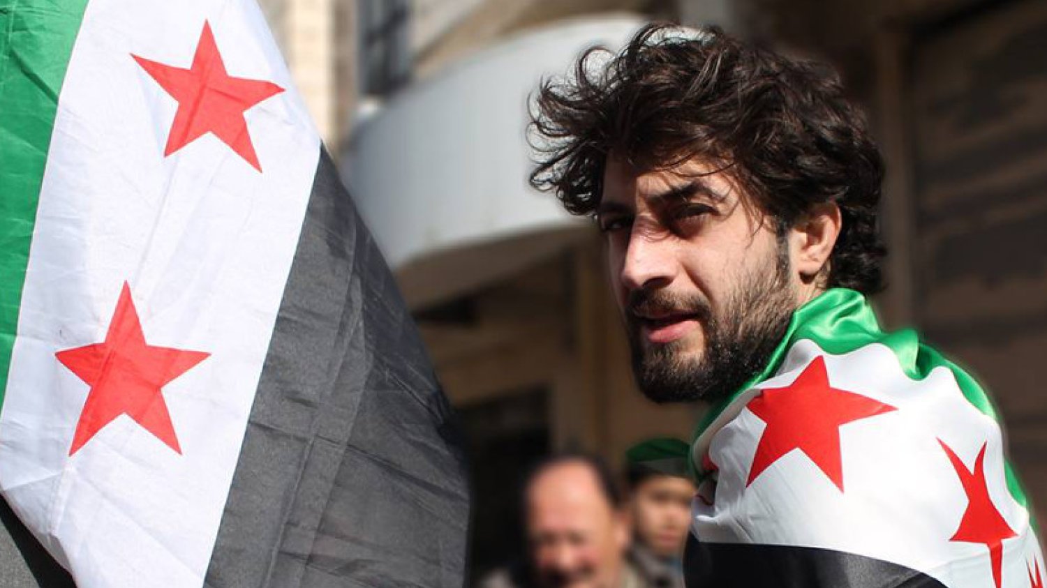 24-letni Asaad Kanjo mówi, że w Syrii toczy się wojna nie tylko z reżimem, ale także z Al-Kaidą