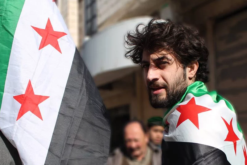 24-letni Asaad Kanjo mówi, że w Syrii toczy się wojna nie tylko z reżimem, ale także z Al-Kaidą