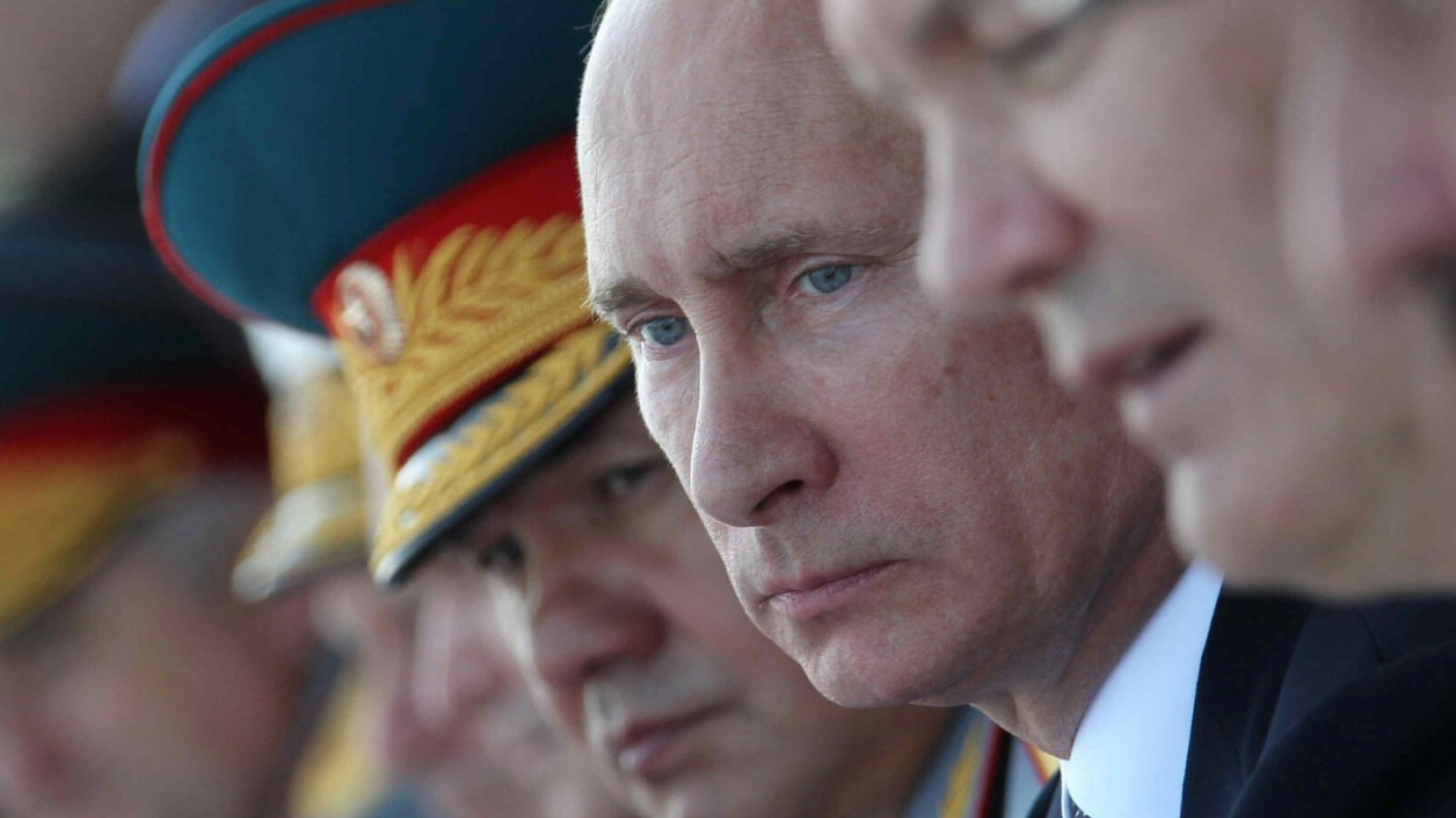 Władimir Putin, w tle szef MON Rosji Siergiej Szojgu
