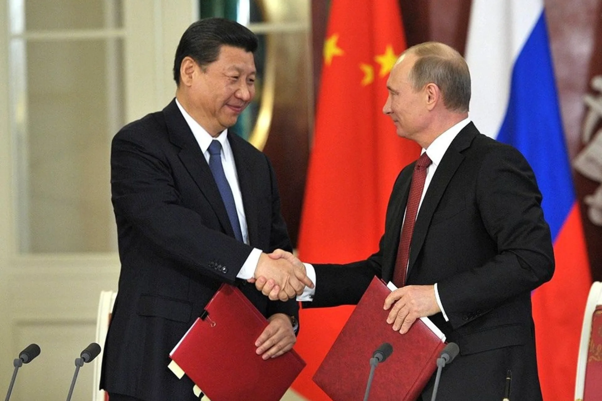 Władimir Putin i Xi Jinping na wspólnym zdjęciu w 2013 roku.