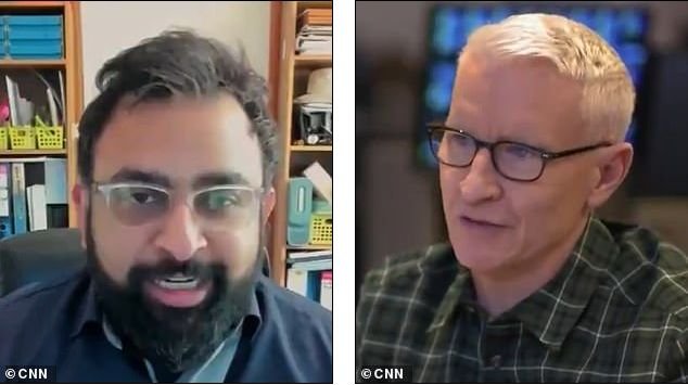 Od lewej: były wyznawca Qanon Jitarth Jadeja i dziennikarz CNN Anderson Cooper. Od lewej: były wyznawca Qanon Jitarth Jadeja i dziennikarz CNN Anderson Cooper.