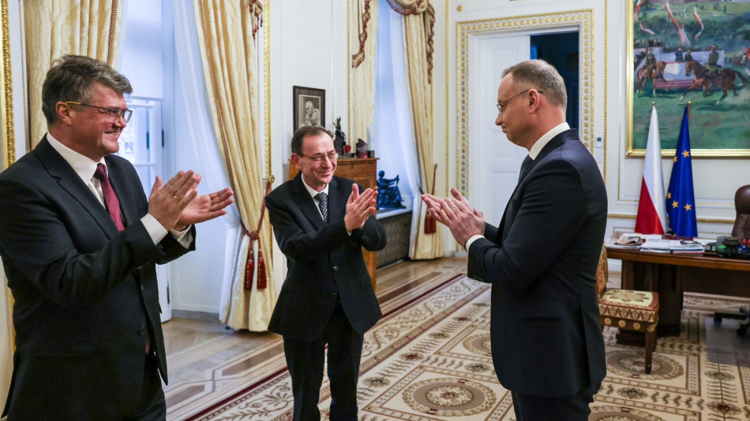 Wąsik i Kamiński po raz pierwszy u Dudy od czasu aresztowania. Wymowne kadry z Pałacu