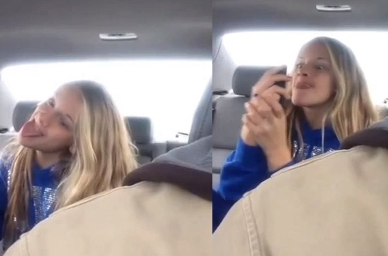 Ojciec nagrał córkę, która robi sobie selfie.