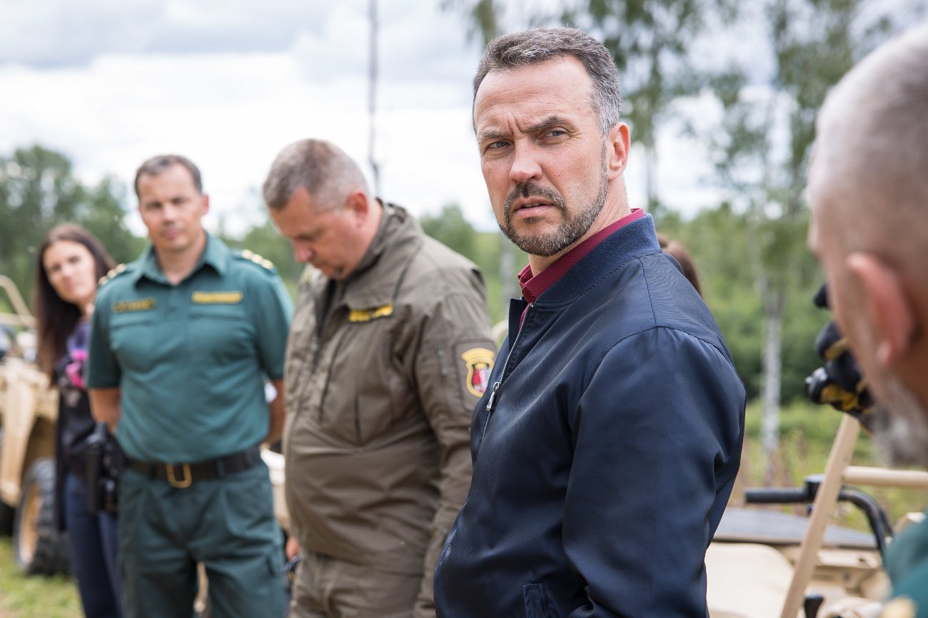 Na pierwszym planie Kristaps Eklons, łotewski minister spraw wewnętrznych