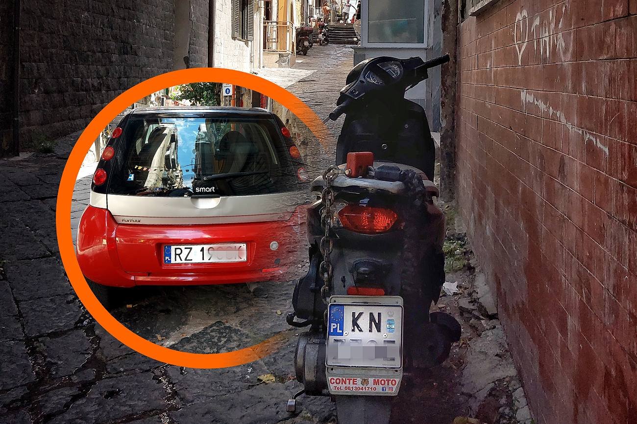 Samochód i skuter z Włoch na polskich tablicach rejestracyjnych.