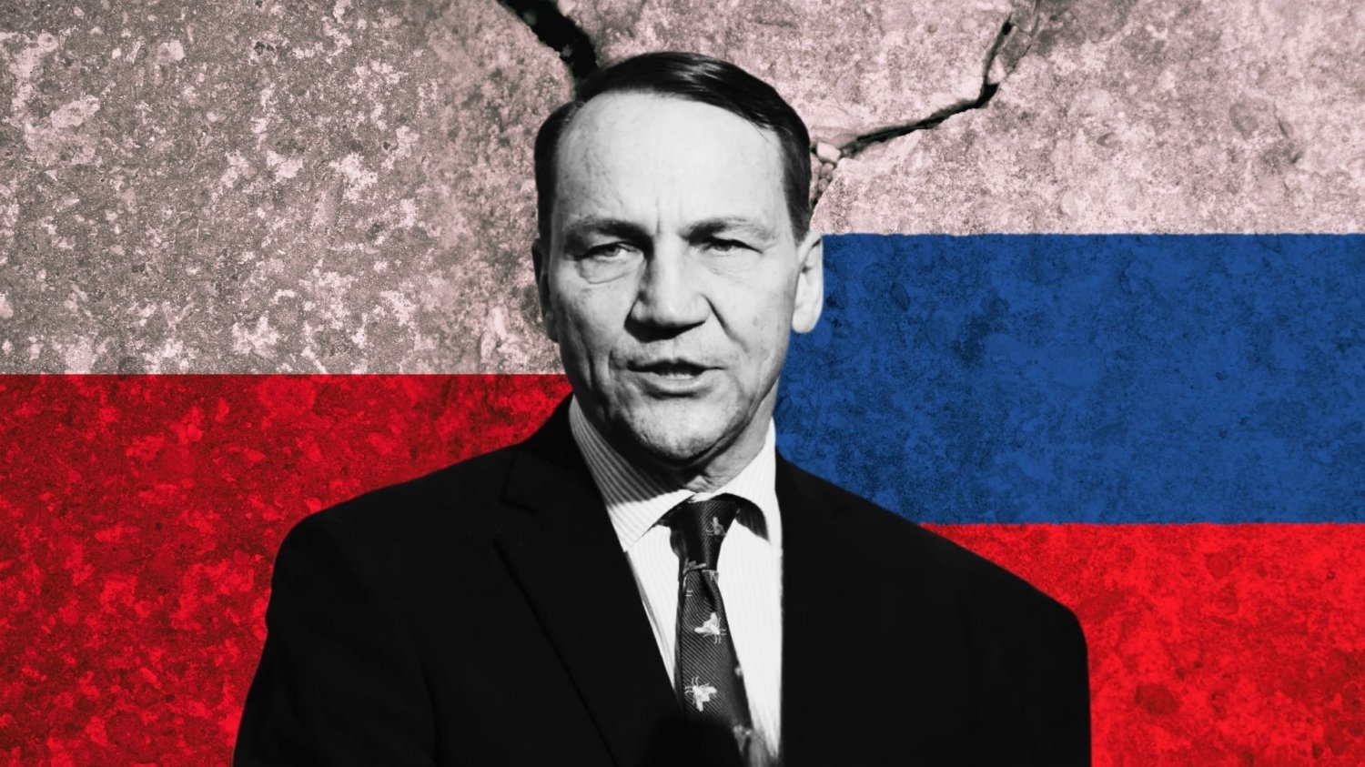 Radosław Sikorski. Mur z namalowaną flagą Polski i Rosji