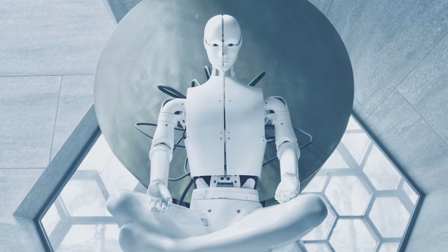Robot na tle futurystycznego pomieszczenia.